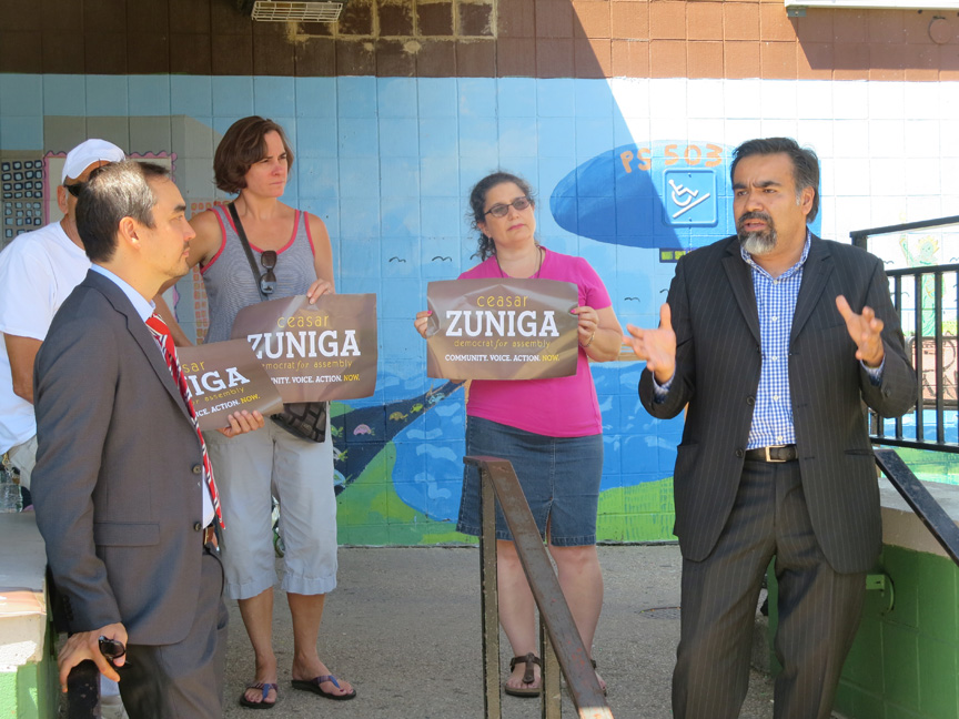Ceasar Zuniga speaking on August 18th, as Lt. Governor candidate Tim Wu watches.